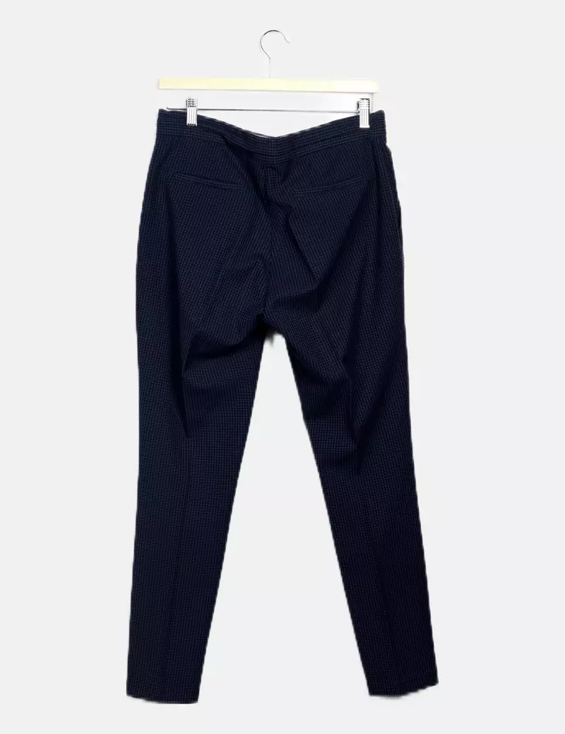 Blue casual trousers by Uterqüe.